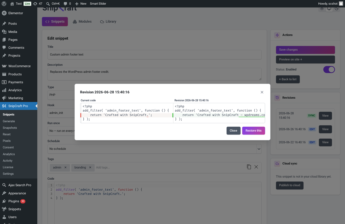 The revision diff viewer comparing a past revision against the current snippet code